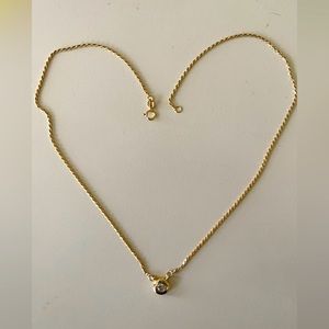 14k gold necklace with diamond.